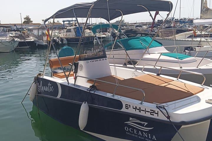 Unlicensed Boat Rental in Marbella: Trimaran Day Hire & Coastal Self-Guided Cruise photo 3