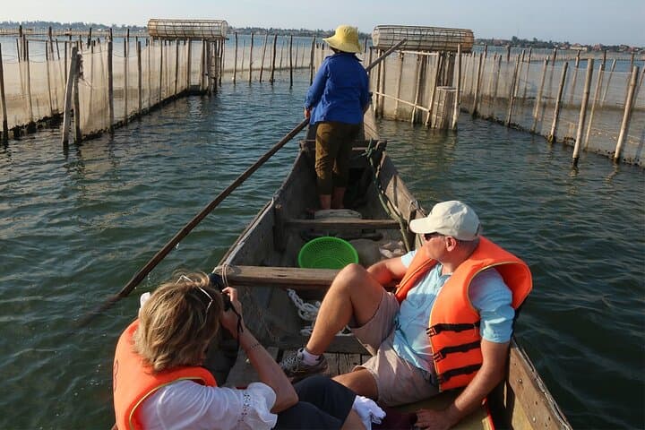 Tam Giang Lagoon Sunset Cruise from Hue — Private Sampan Tour with Seafood Dinner photo 1