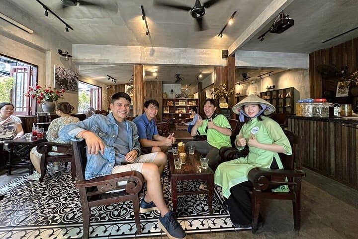 Scooter Through Saigon: Afternoon Historical Tour with Ao Dai Riders photo 2
