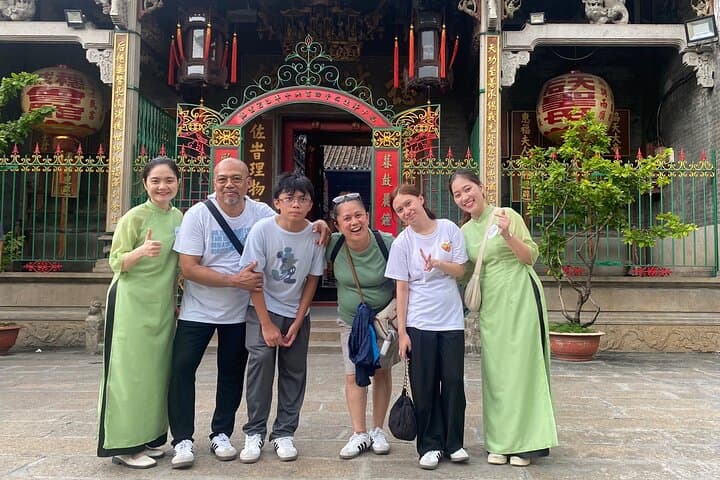 Scooter Through Saigon: Afternoon Historical Tour with Ao Dai Riders photo 5
