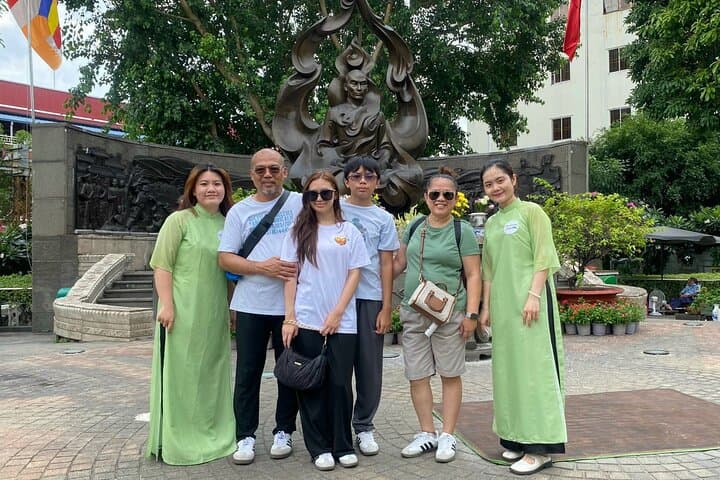 Scooter Through Saigon: Afternoon Historical Tour with Ao Dai Riders
