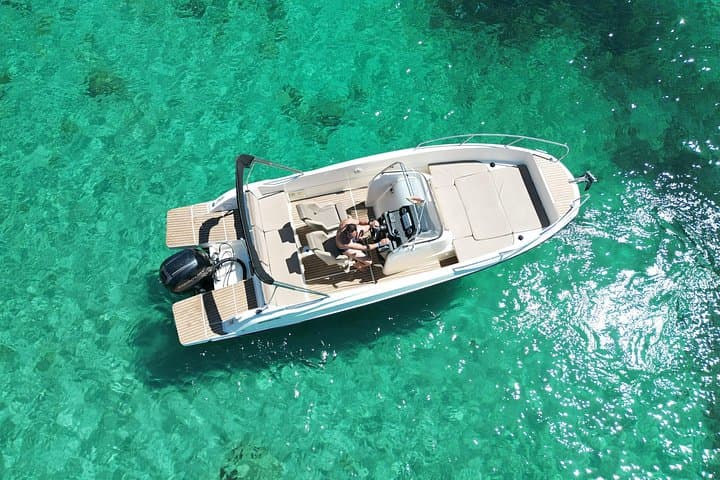 Private Ibiza Boat Tour: Paddle Surfing & Snorkeling from San Antonio photo 3