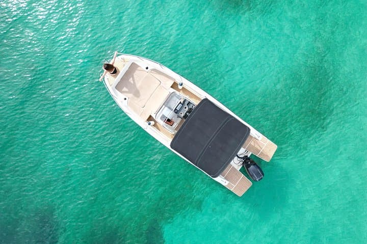 Private Ibiza Boat Tour: Paddle Surfing & Snorkeling from San Antonio photo 1