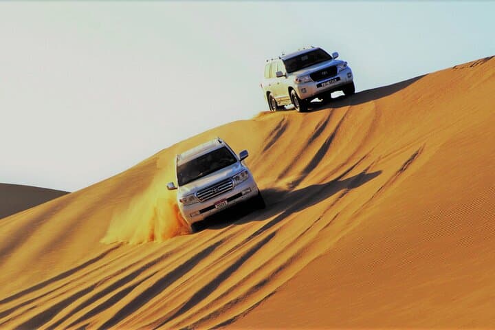 Overnight Dubai Desert Camping Safari: Dune Bashing, Camel Rides & BBQ Under the Stars photo 4