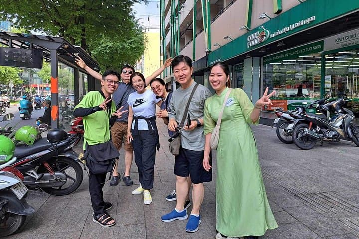 Morning Saigon Unseen Scooter Tour: Historic Alleys, Temples & Floating Markets photo 1