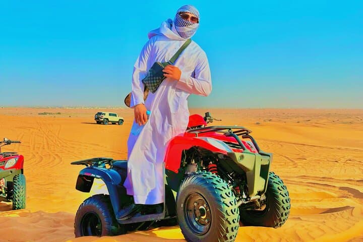 Dubai Red Dune Desert Safari: Quad Biking, Camel Ride & BBQ Dinner