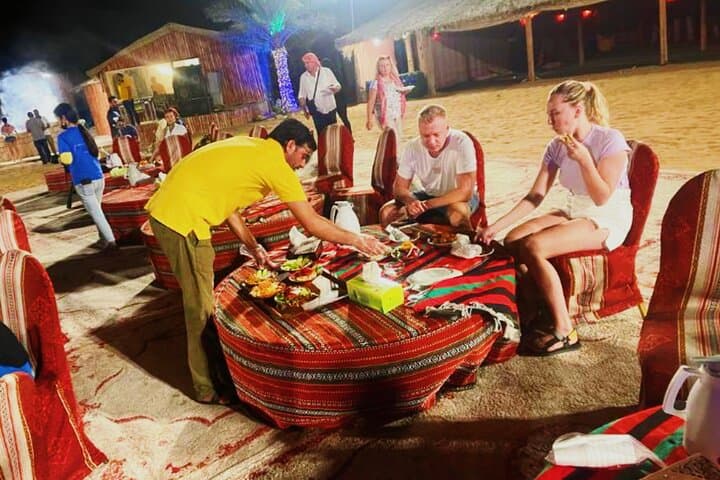 Dubai Red Dune Desert Safari: Quad Biking, Camel Ride & BBQ Dinner photo 4