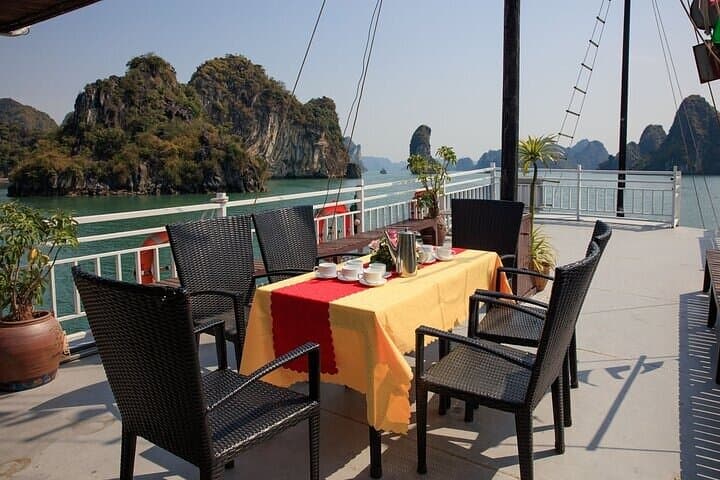 Halong Bay 6-Hour Shared Boat Tour with Cave Kayak & Titov Beach