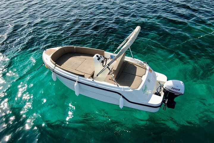 Rent a License-Free Boat in Sant Antoni, Ibiza — Explore Coves & Sunset Cruises photo 1