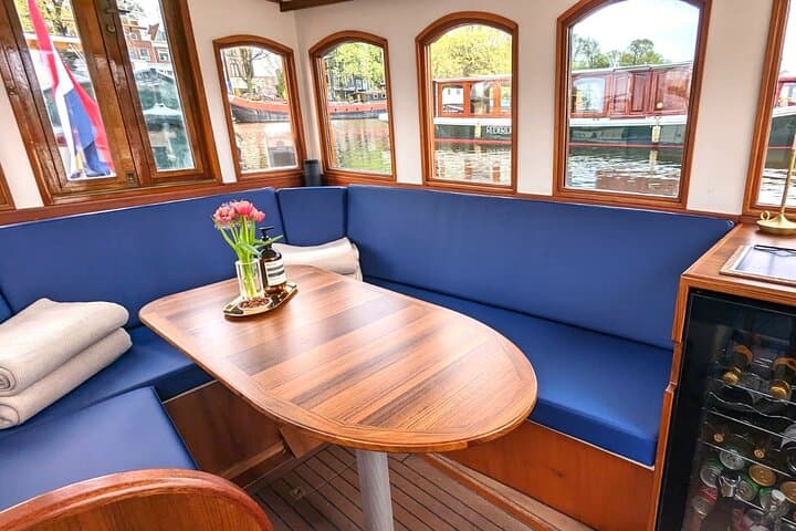 Private Amsterdam Canal Cruise: 2-Hour Historic Boat Tour with Welcome Drink photo 2