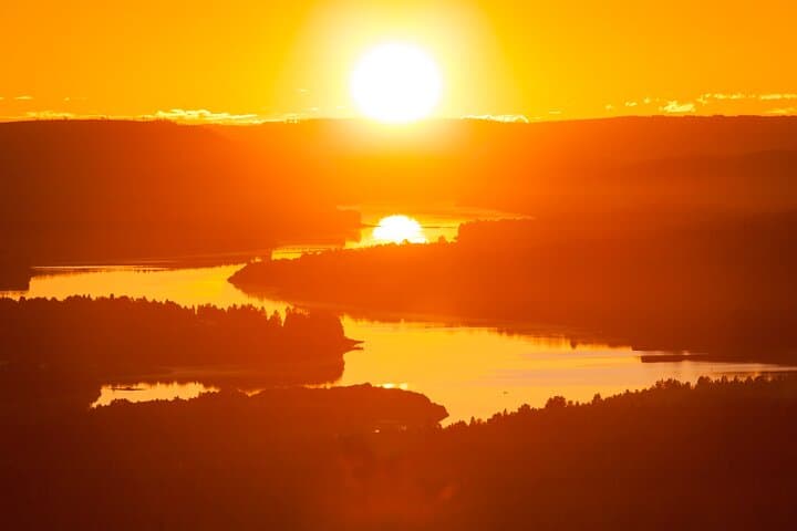 Arctic Wilderness Sunset Hike from Rovaniemi — Midnight Sun, Firecraft & Survival Skills
