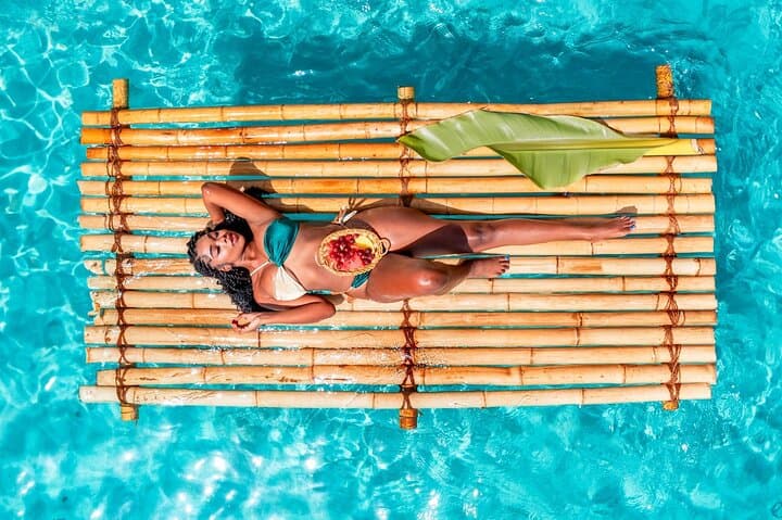Bamboo Raft Photoshoot in Curaçao — Float, Sip & Capture Island Portraits