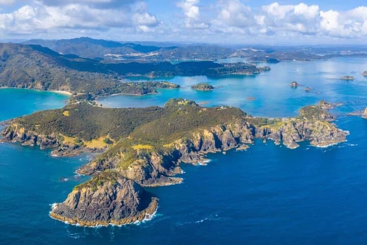 Bay of Islands Day Tour from Auckland — Hole in the Rock Cruise & Dolphin Watching photo 4