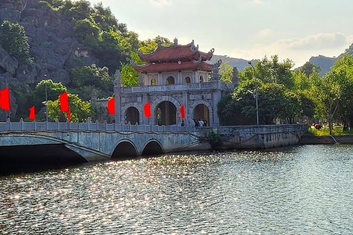 Ninh Binh Excursion: Tam Coc Boat Ride, Mua Cave Climb, Biking & Sunset Party from Hanoi photo 3
