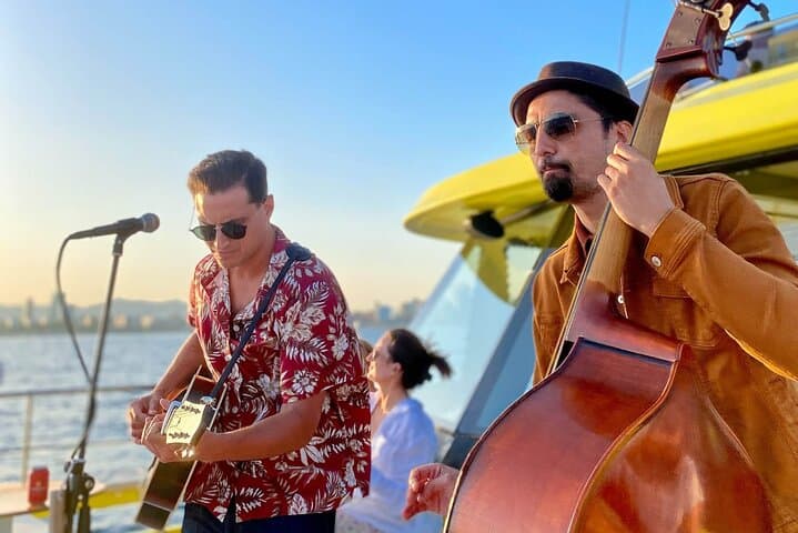 Sunset Eco-Catamaran Cruise in Barcelona: Live Music & Port Vell Views photo 1