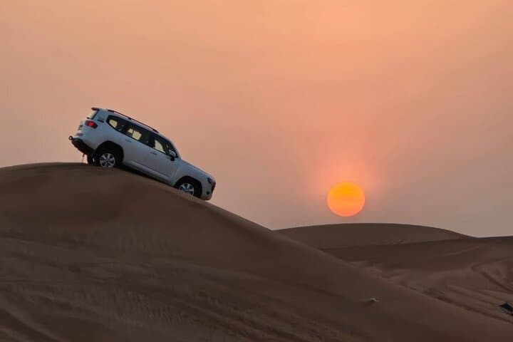 Red Dunes After Dark: Dubai Evening Safari with Quad Biking, VIP BBQ & Live Shows photo 5