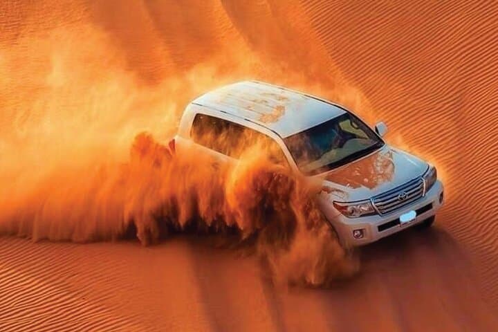 Dubai Red Dune Desert Safari: VIP Camel Ride, Sandboarding & BBQ Dinner