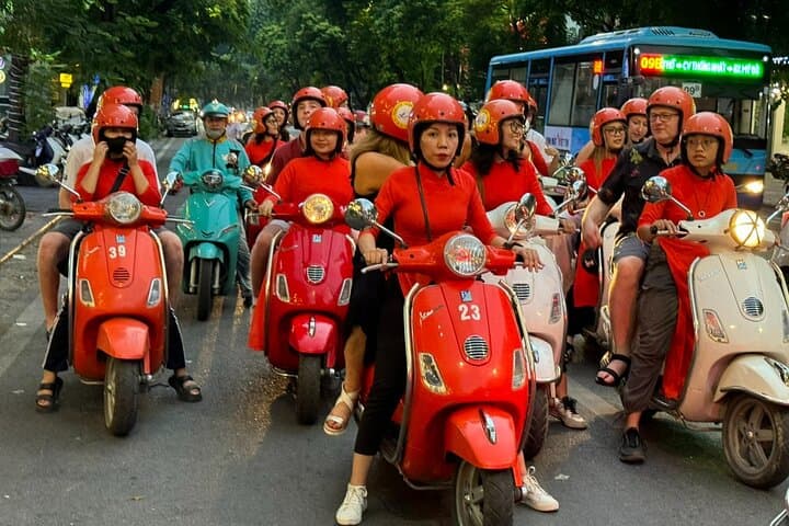 Hanoi Night Vespa Food Tour with Female Ao Dai Riders and Train Street photo 2