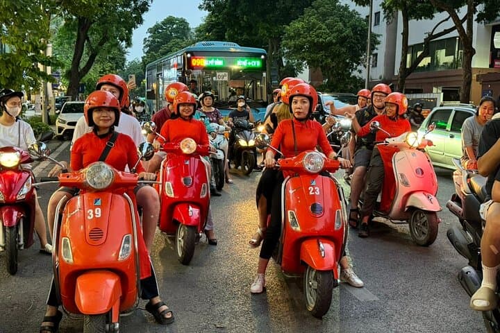 Hanoi Night Vespa Food Tour with Female Ao Dai Riders and Train Street photo 3