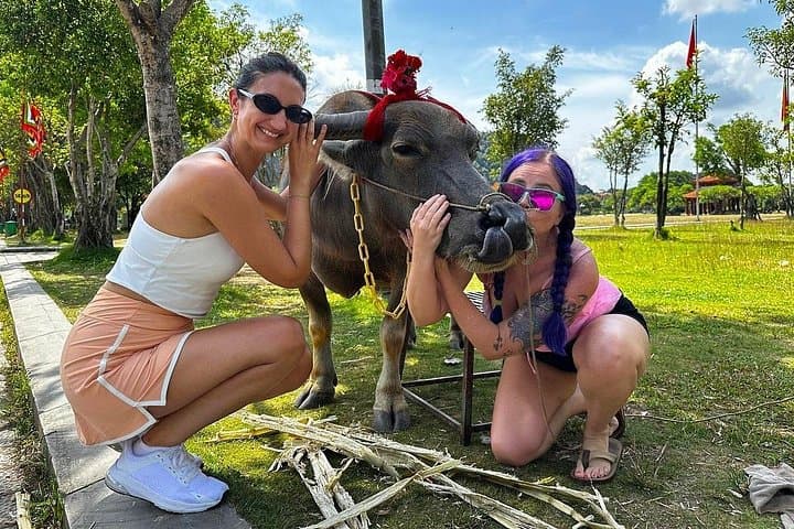Explore Trang An and Hoa Lu: Full-Day Cycling, Boat Trip & Local Family Experience from Hanoi photo 2