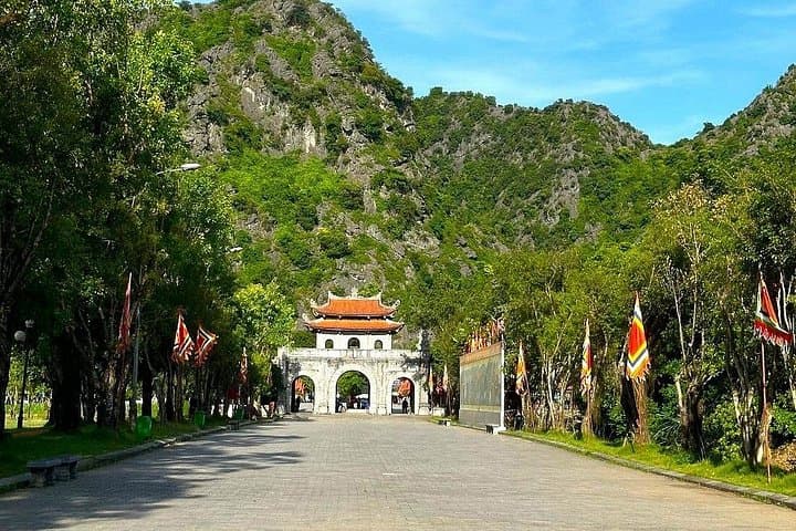 Explore Trang An and Hoa Lu: Full-Day Cycling, Boat Trip & Local Family Experience from Hanoi photo 4