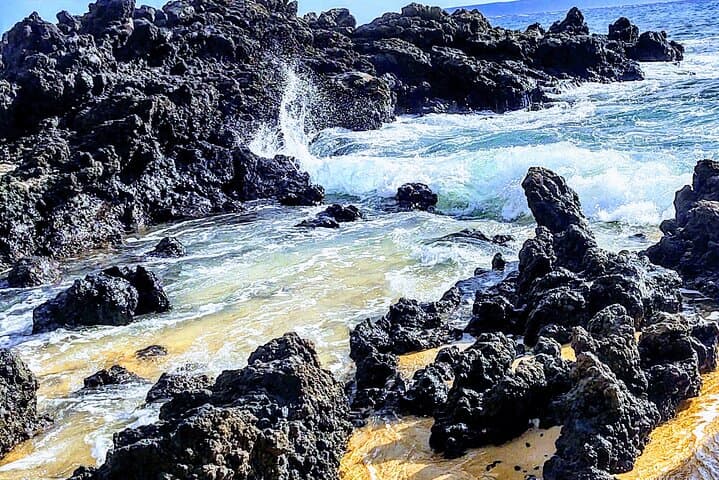 Halfway to Hana Private Tour — Black Sand Beaches, Waterfalls & Turtles from Kahului photo 2