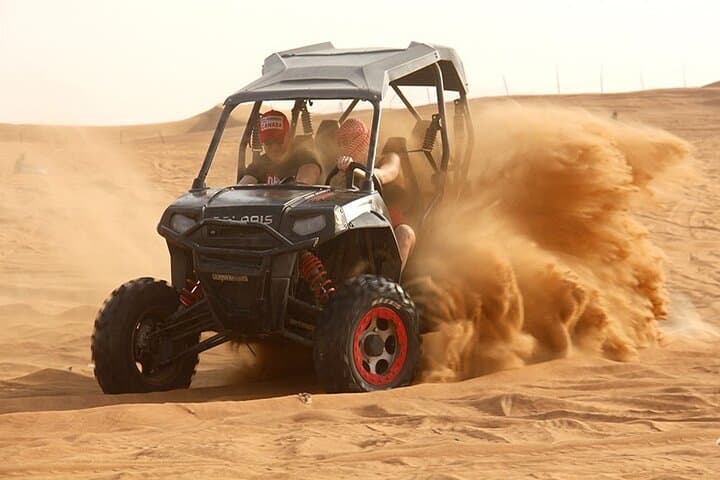 Drive the Red Dunes: 1-Hour Polaris Buggy Adventure with Camel Ride & Sandboarding photo 3