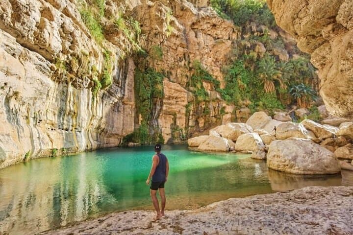 Wadi Tiwi & Bimmah Sinkhole Day Trip: Swim Emerald Pools and Explore Coastal Caves photo 5
