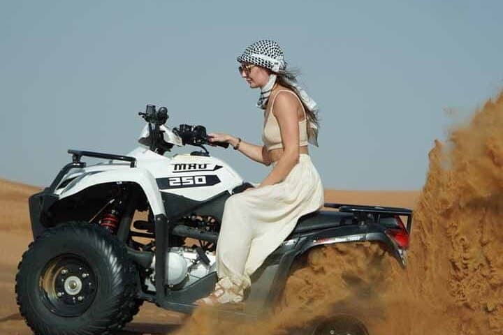 Dubai Red Dunes ATV Desert Safari with Camel Ride, Sunset & BBQ photo 3