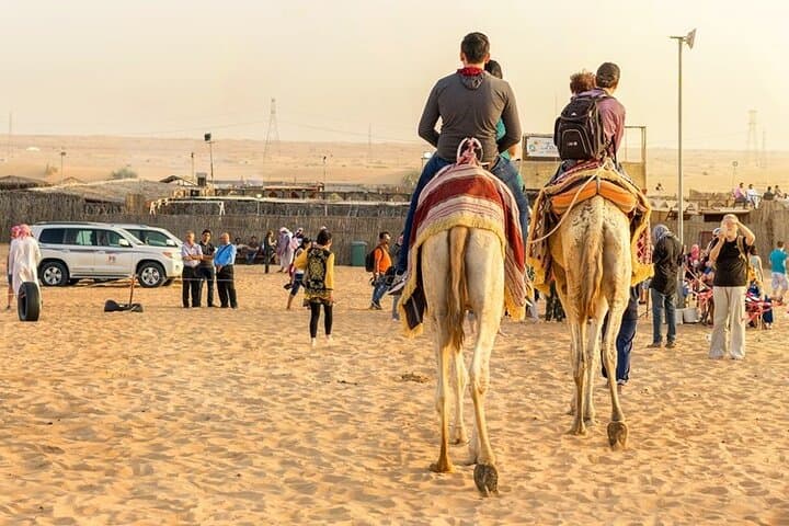 Dubai Red Dunes ATV Desert Safari with Camel Ride, Sunset & BBQ photo 2