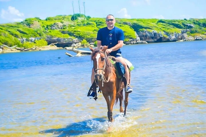 Unbridled Adventures: Horseback Riding on Macao Beach photo 3