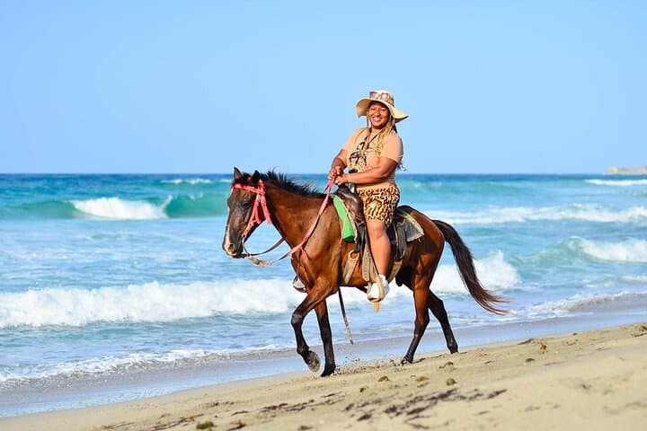 Unbridled Adventures: Horseback Riding on Macao Beach photo 6