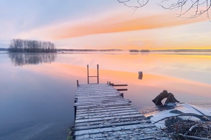 Traditional Finnish Sauna and Ice Swimming Near Rovaniemi — Arctic Heat-and-Cold Therapy