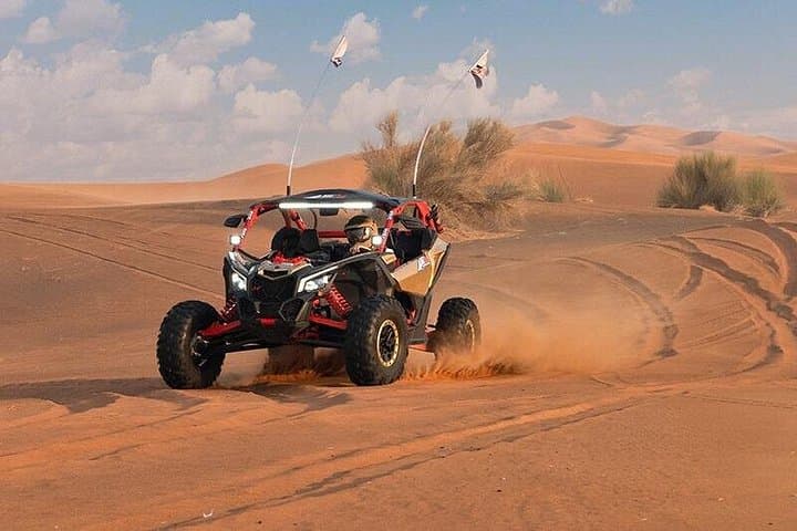 Can-Am Buggy Lahbab Red Dunes: 1-Hour Self-Drive Adventure with Camel Ride & Sandboarding photo 5