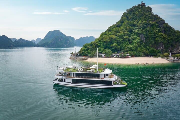 Luxury Halong Bay Day Cruise: Sung Sot Cave, Ti Top Hike, Kayaking & Sunset Party