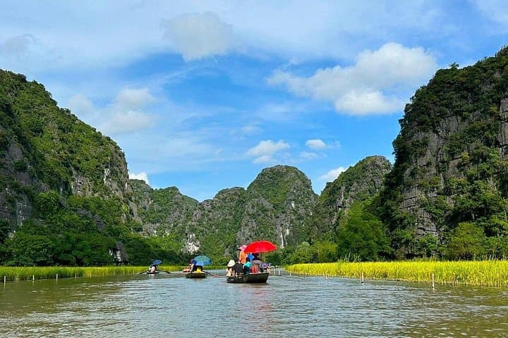 Day Trip from Hanoi to Tam Coc, Hoa Lu & Mua Cave — Sampan Rides, Village Bikes, and Mountain Viewpoints photo 4