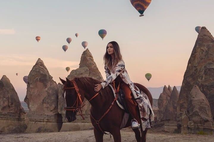 Sunset Horse Riding in Cappadocia — Ride Rose & Red Valleys with Balloon Views photo 2