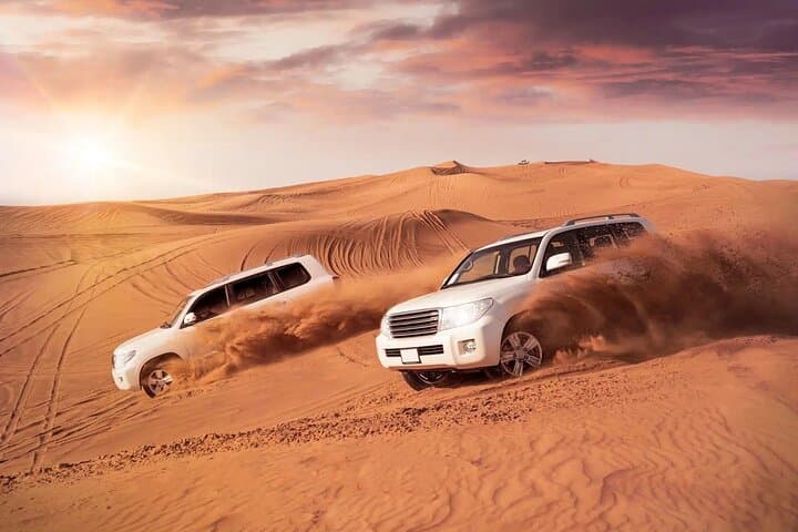 Evening Dubai Desert Safari: Dune Bashing, Camel Rides & Live BBQ Experience photo 5