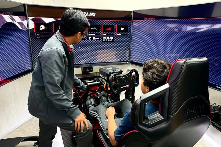 Professional Racing Simulator at Cancun Airport — Full-Motion Sim Racing Experience photo 4
