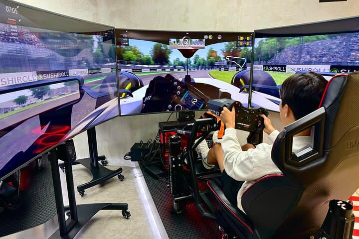 Professional Racing Simulator at Cancun Airport — Full-Motion Sim Racing Experience photo 5