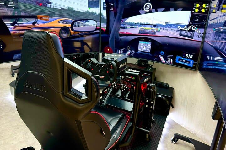 Professional Racing Simulator at Cancun Airport — Full-Motion Sim Racing Experience