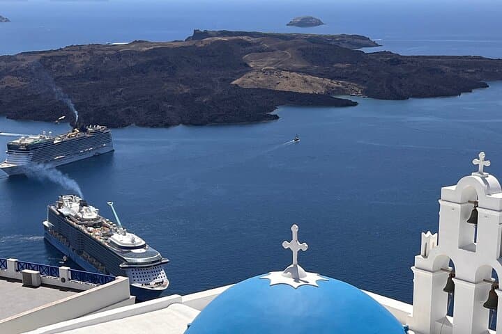 Half-Day Private Santorini Van Tour: Oia, Fira, Red Beach & Kamari photo 1