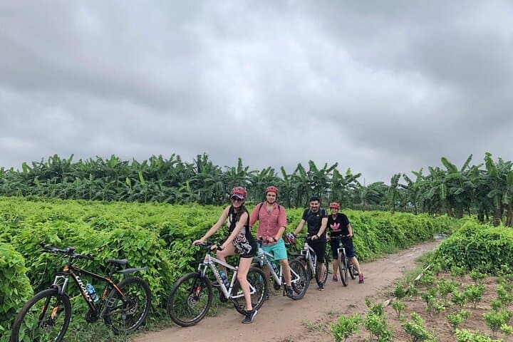 Half-Day Hanoi Bicycle Tour: City Streets to Riverside Villages photo 1