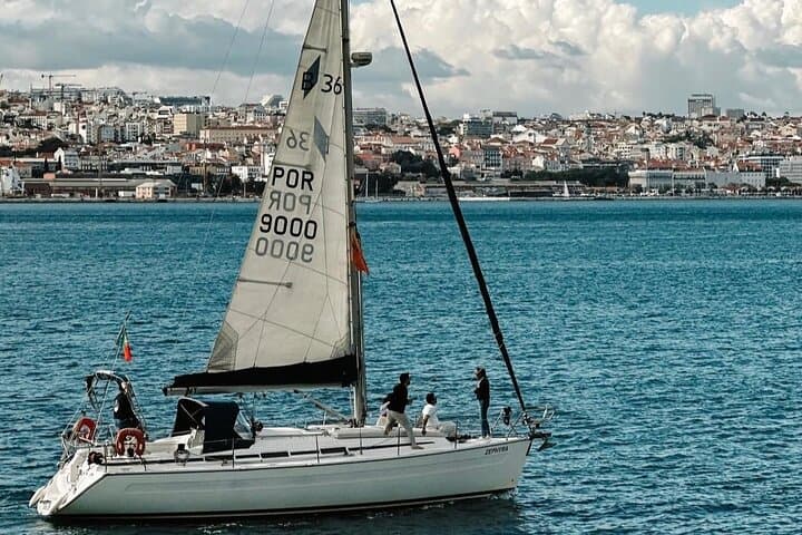 Sail the Tagus: 2-Hour Lisbon Sailboat Excursion with Sunset and Dolphins photo 4