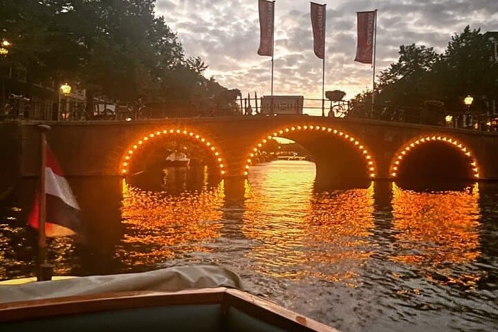 Romantic Private Amsterdam Canal Cruise 90-Min Evening Boat Tour with Welcome Drink photo 3