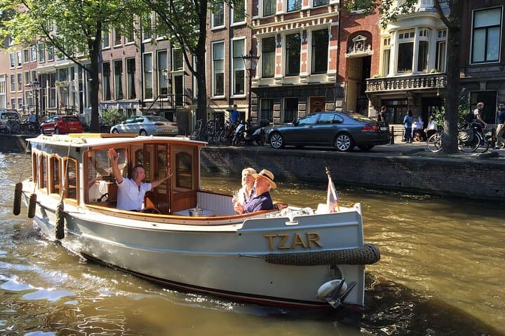 Romantic Private Amsterdam Canal Cruise 90-Min Evening Boat Tour with Welcome Drink photo 4