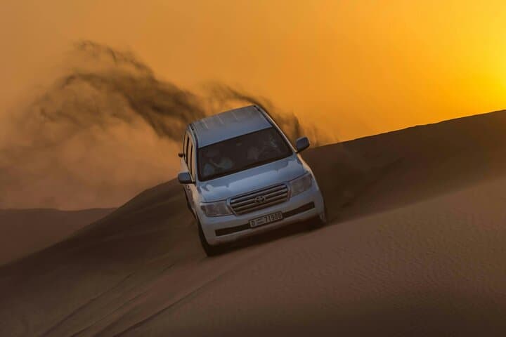 Dubai Red Dune Desert Safari: VIP Camel Ride, Sandboarding & BBQ Dinner photo 2