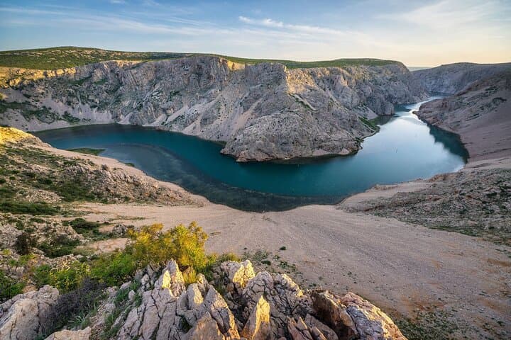 Zrmanja Canyon Cruise from Novigrad — Swim, Bridges & Velebit Views