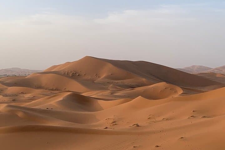 Sunset Dinner & Berber Music in Merzouga Desert — 4WD, Sandboarding & Camp Experience photo 2