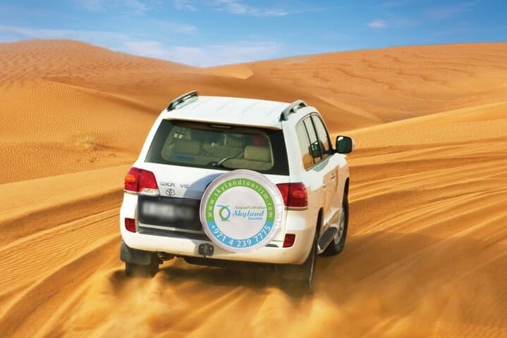 Dubai Desert Safari: Dune Bashing, Sandboarding & BBQ Evening